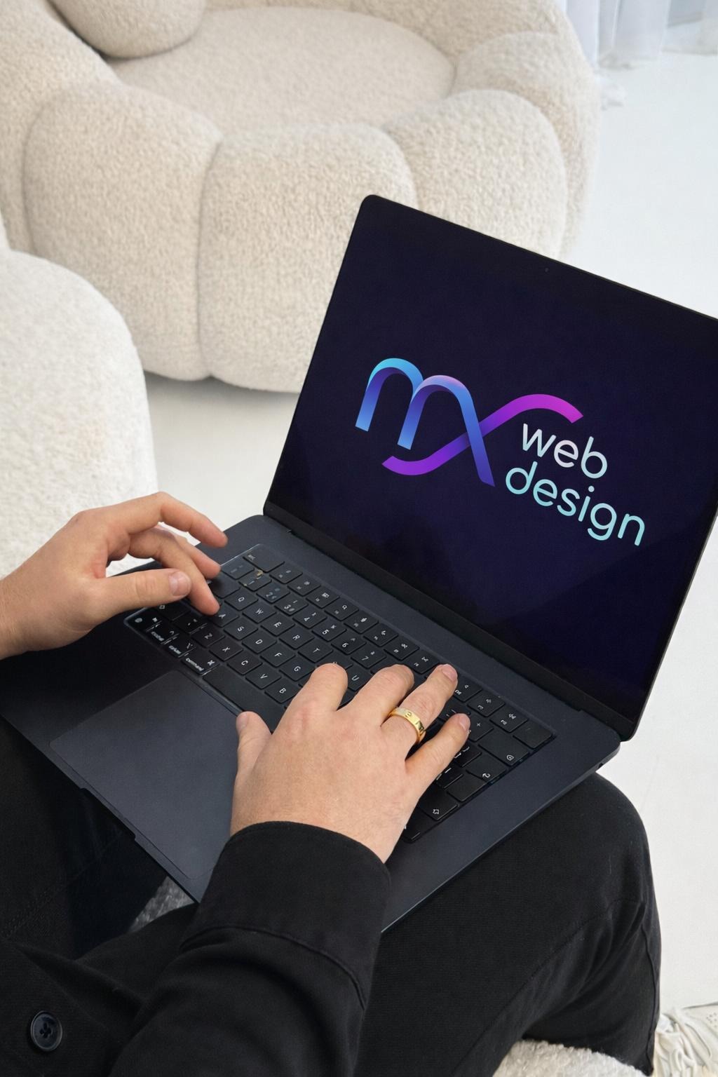Max Harrington working on an MX Web Design client website